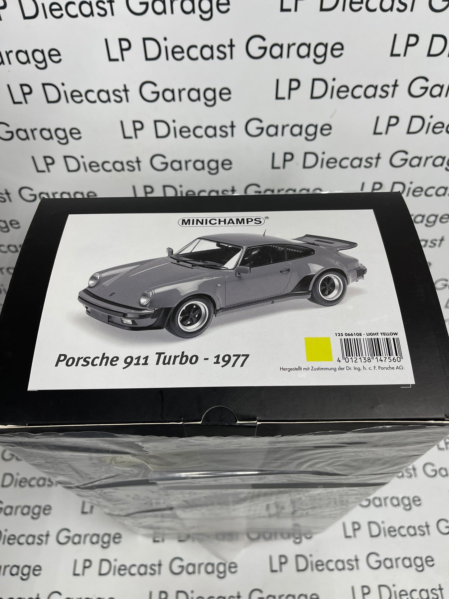 MINICHAMPS 1977 Porsche 911 Turbo Light Yellow 1:12 Scale Resin Model