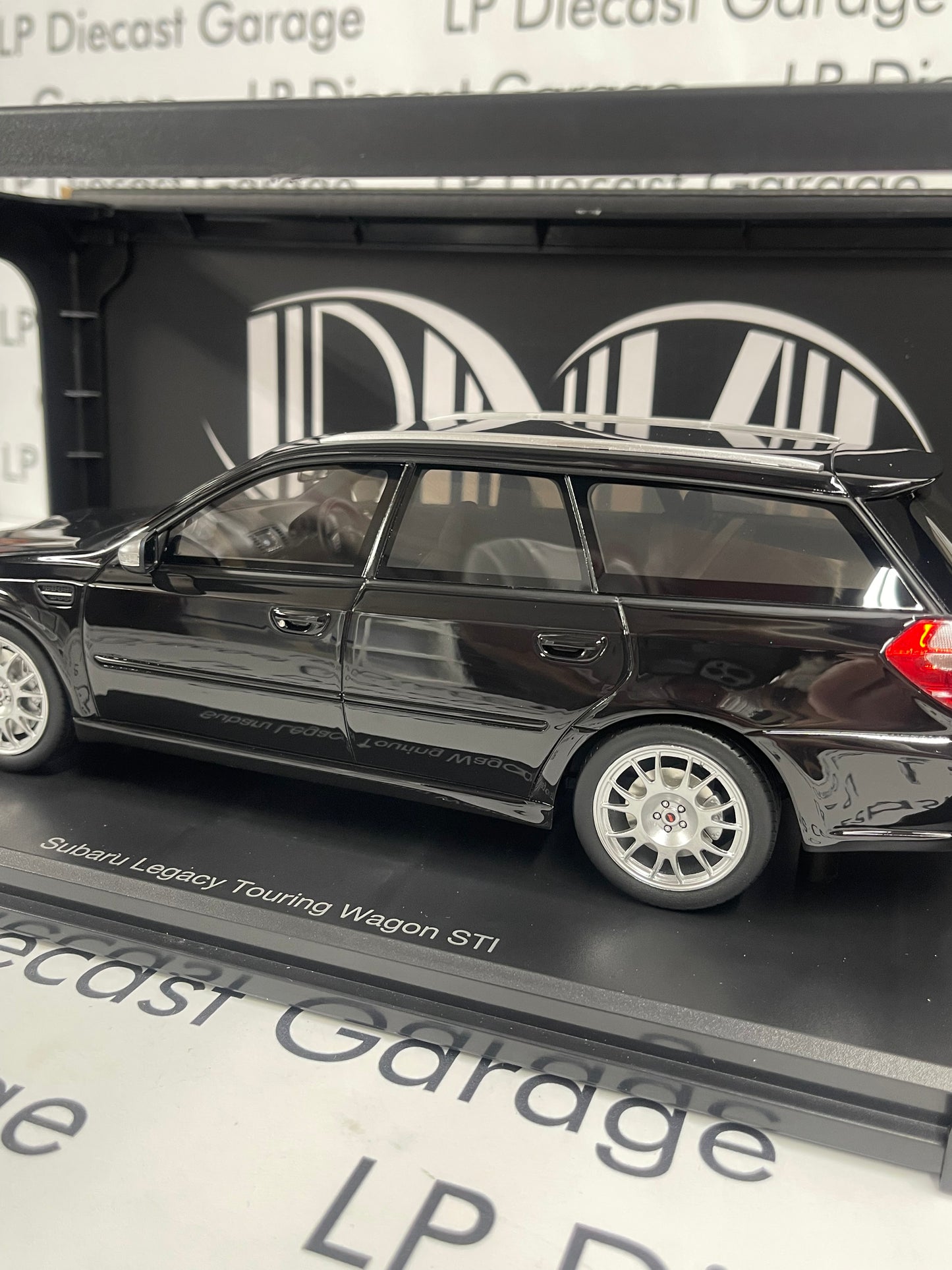 DNA Collectibles 2006 Subaru Legacy Touring Wagon STI S402 Black 1:18 Scale Resin Model