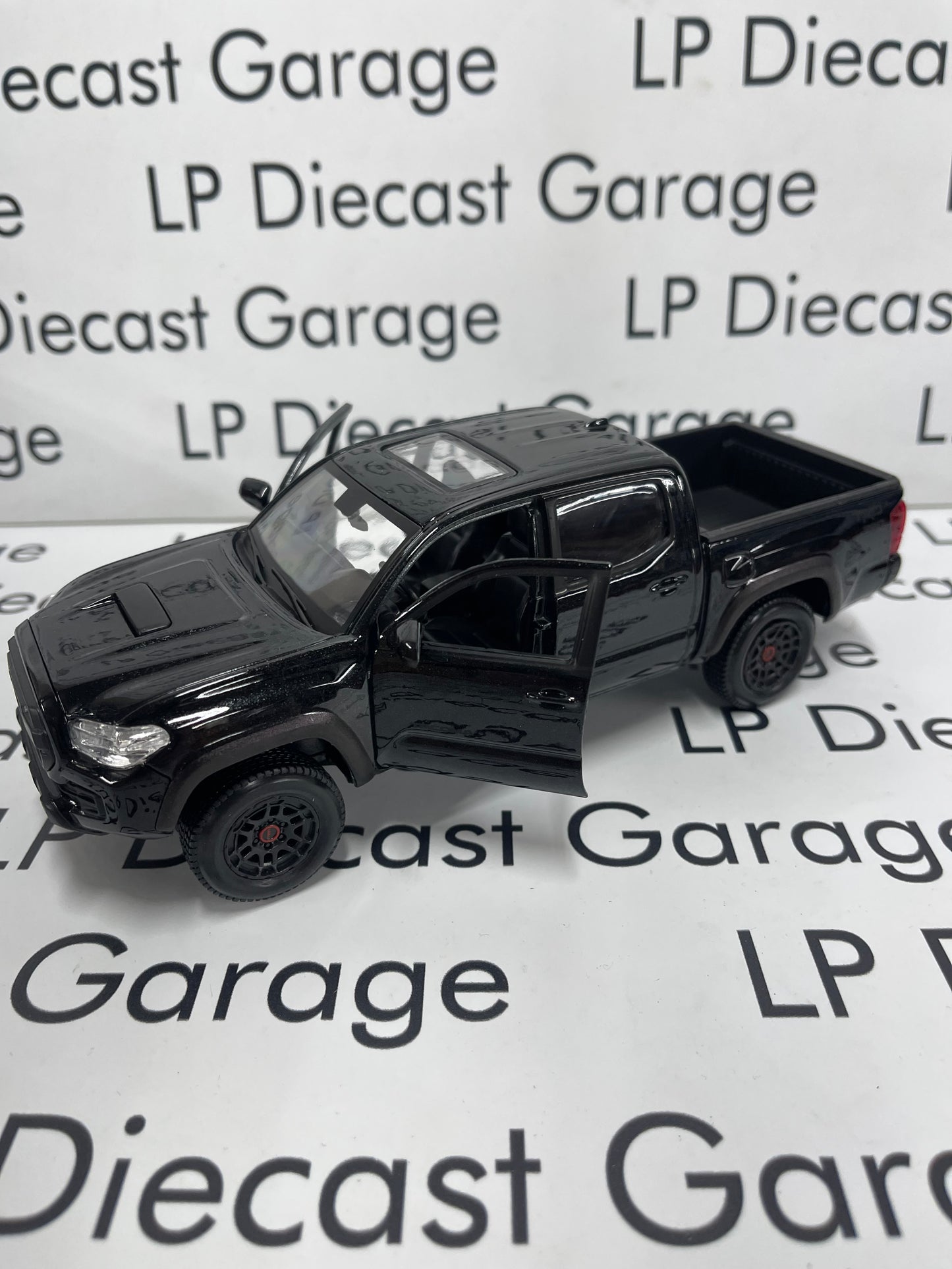 MAISTO 2023 Toyota Tacoma TRD Pro Truck Crew Cab Black No Box 1:27 Diecast