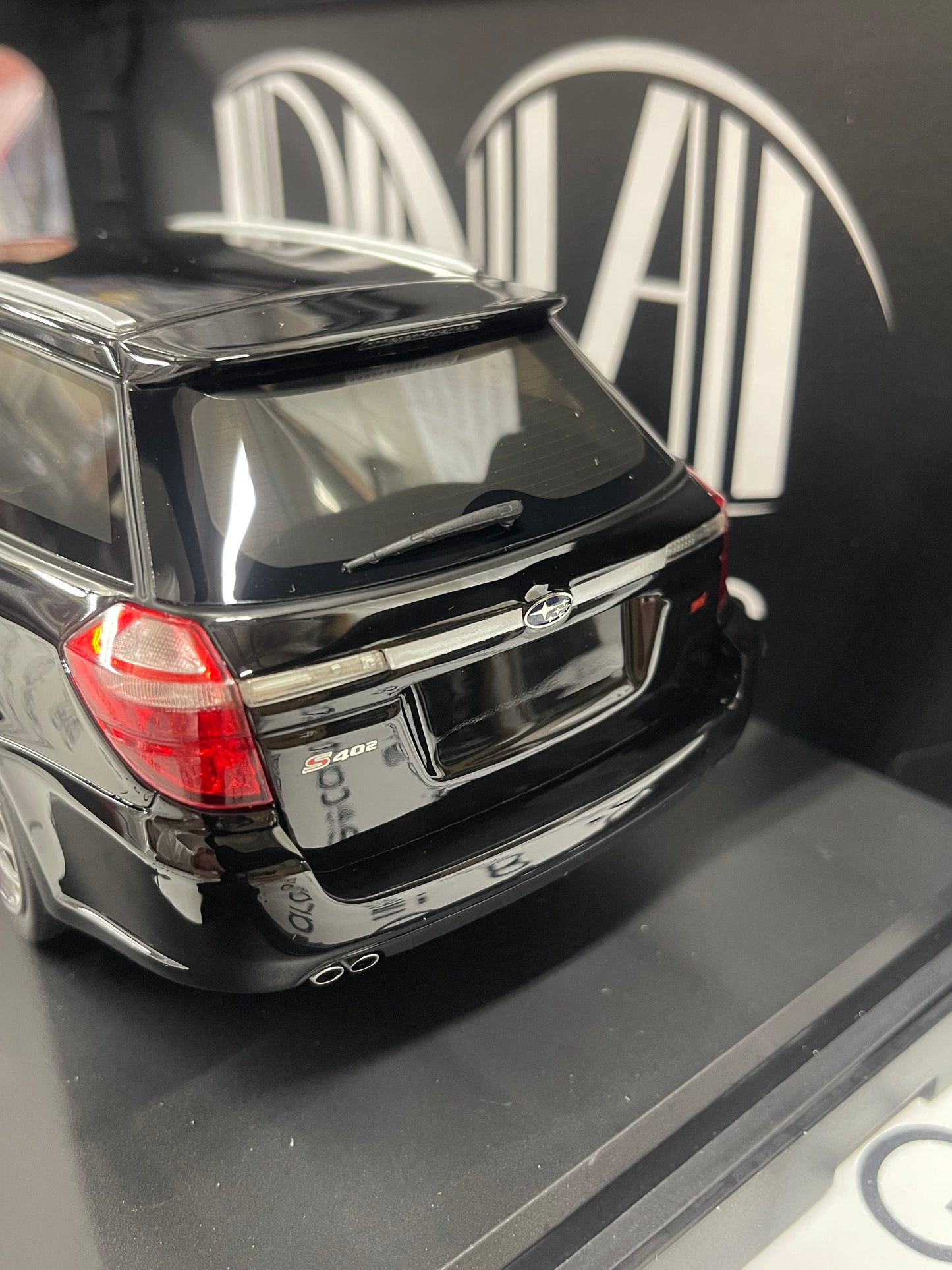 DNA Collectibles 2006 Subaru Legacy Touring Wagon STI S402 Black 1:18 Scale Resin Model