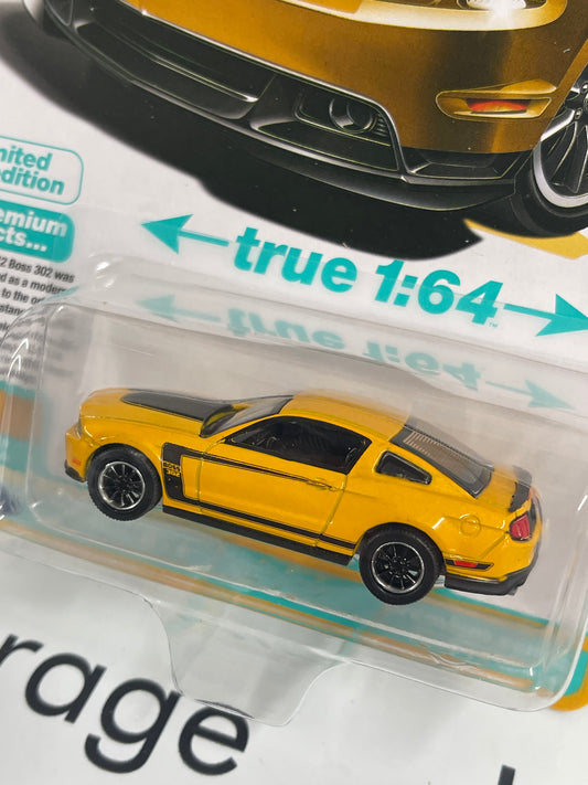 AUTO WORLD 2012 Ford Mustang Boss 302 Yellow 1:64 Diecast Modern Muscle