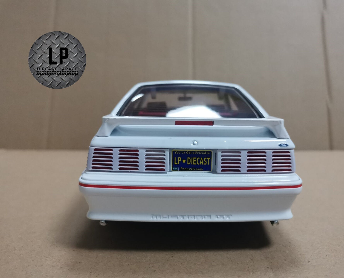 *PRE-ORDER* GMP 1988 Ford Mustang GT Oxford White w/ Red Body Stripe LP Diecast Garage Exclusive 1:18 Diecast Q4 2023 Release