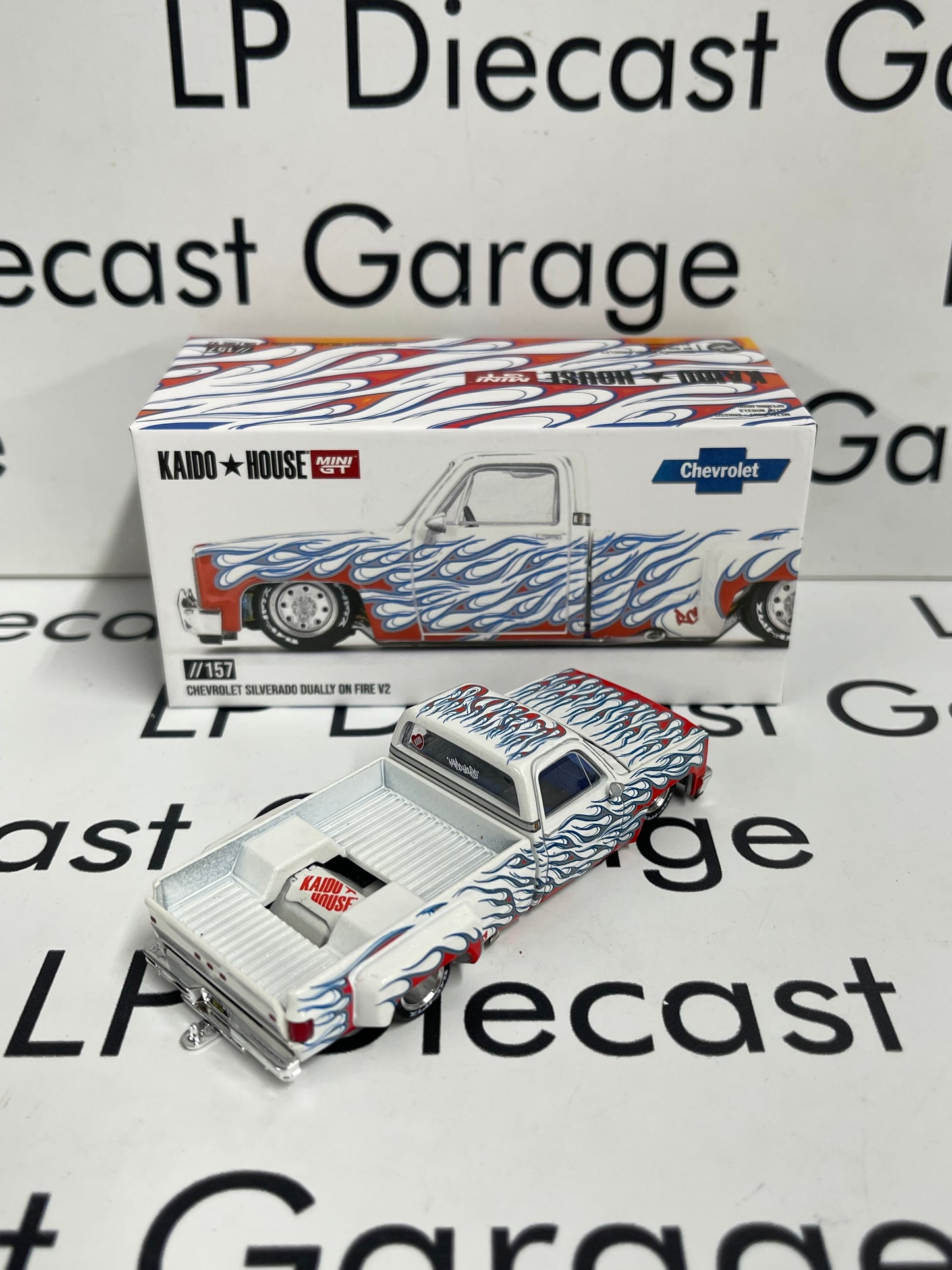 MINI GT KAIDO HOUSE Chevrolet Silverado Dually on Fire V2 White 1:64 Diecast