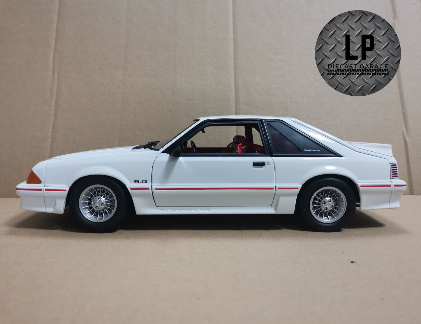 *PRE-ORDER* GMP 1988 Ford Mustang GT Oxford White w/ Red Body Stripe LP Diecast Garage Exclusive 1:18 Diecast Q4 2023 Release