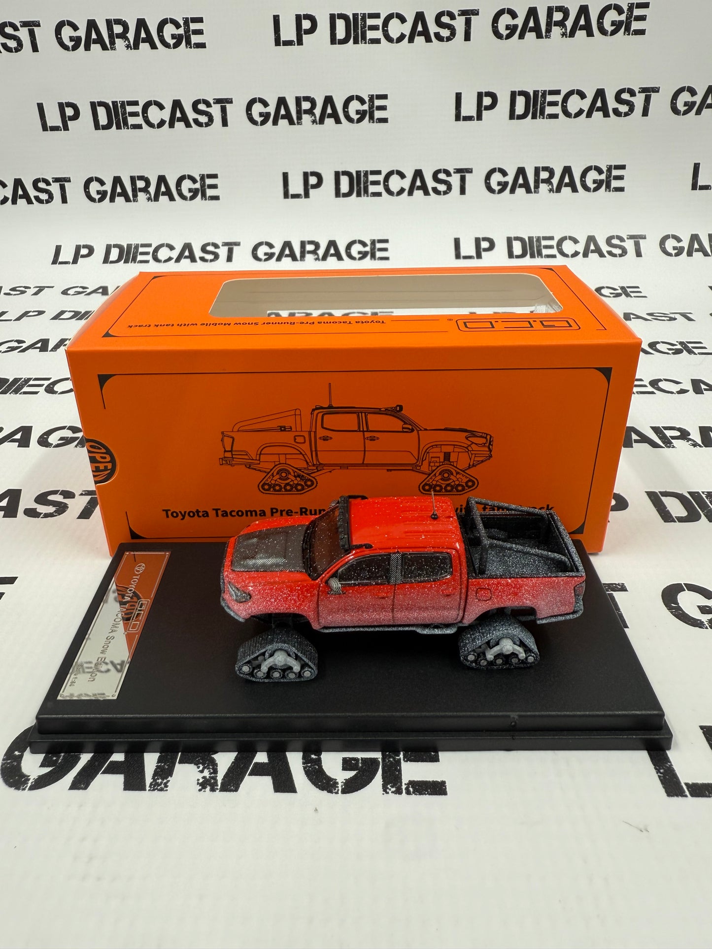 GCD 2023 Toyota Tacoma Snowmobile Red with Tracks 1:64 Diecast Snow Covered