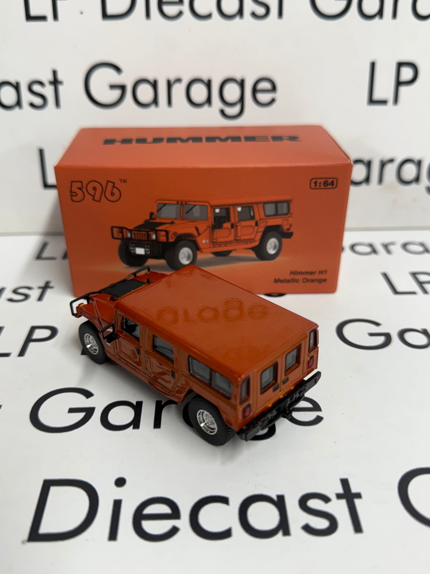 596 Model Hummer H1 Metallic Orange 1:64 Diecast Opening Hood