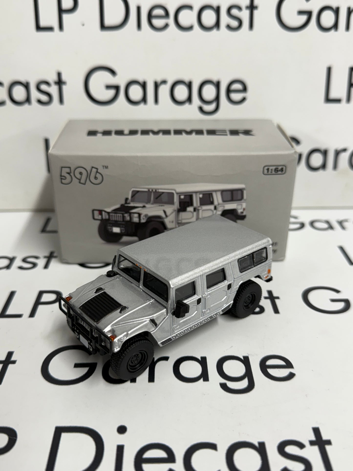 596 Model Hummer H1 Silver 1:64 Diecast Opening Hood