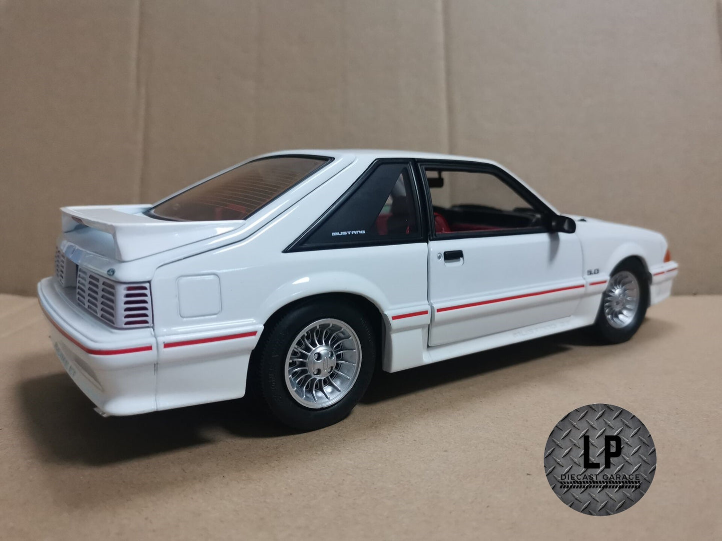 *PRE-ORDER* GMP 1988 Ford Mustang GT Oxford White w/ Red Body Stripe LP Diecast Garage Exclusive 1:18 Diecast Q4 2023 Release