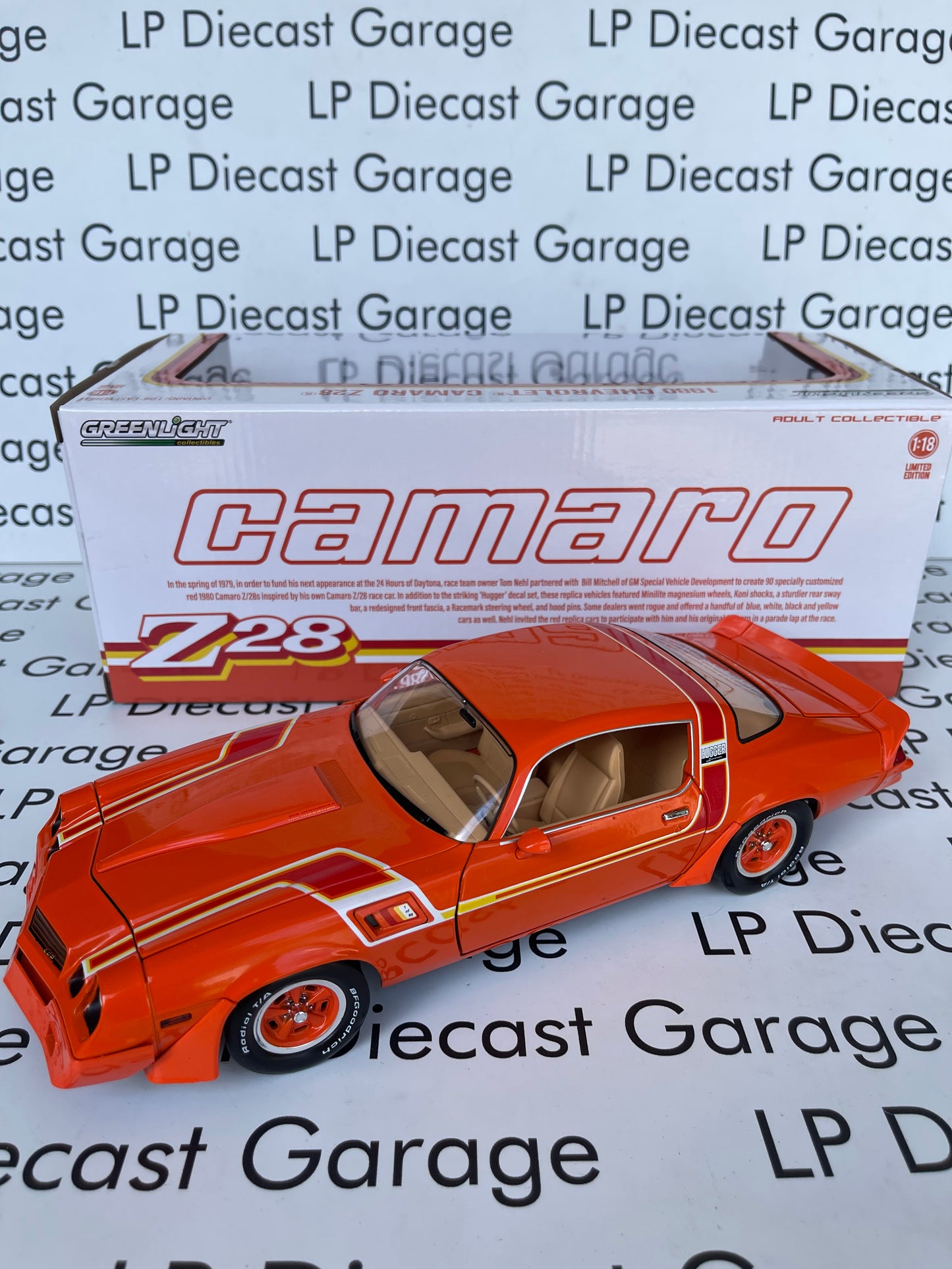 GREENLIGHT 1980 Chevrolet Camaro Z/28 Hugger Hugger Red Orange General Motors Special Vehicle Development 1:18 Diecast