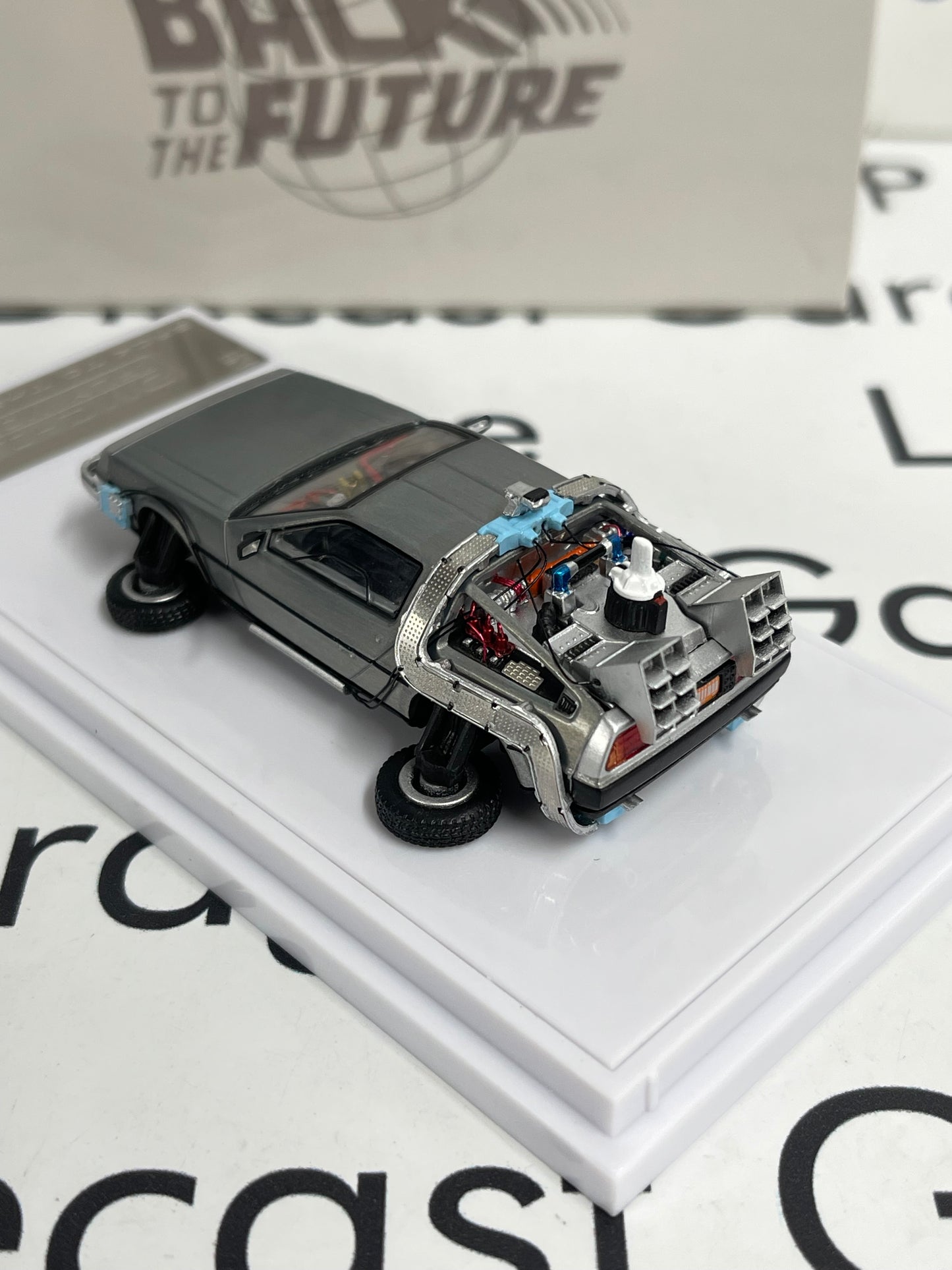 DCM Back to the Future DeLorean Time Machine w/ Extra Parts 1:64 Diecast Ghost Player