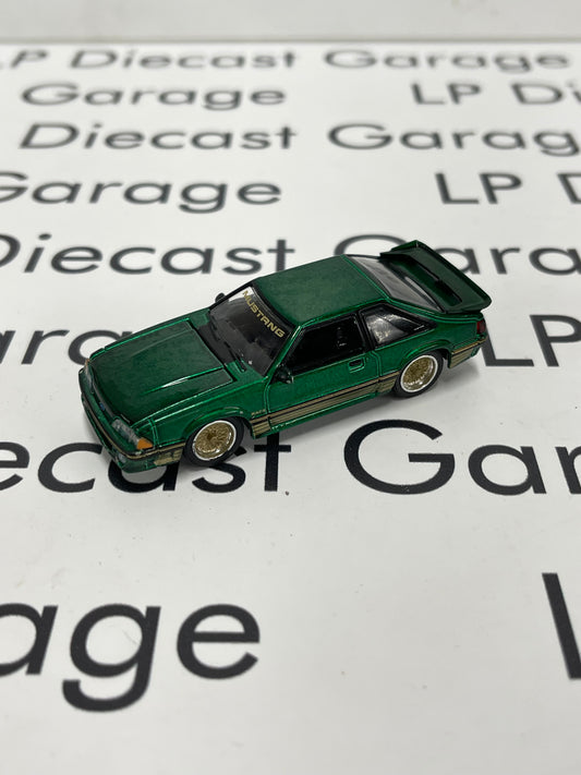GREENLIGHT GREEN MACHINE 1988 Ford Mustang Green with Gold Decals SLN Hatchback 1:64 Diecast *LOOSE* Flaws