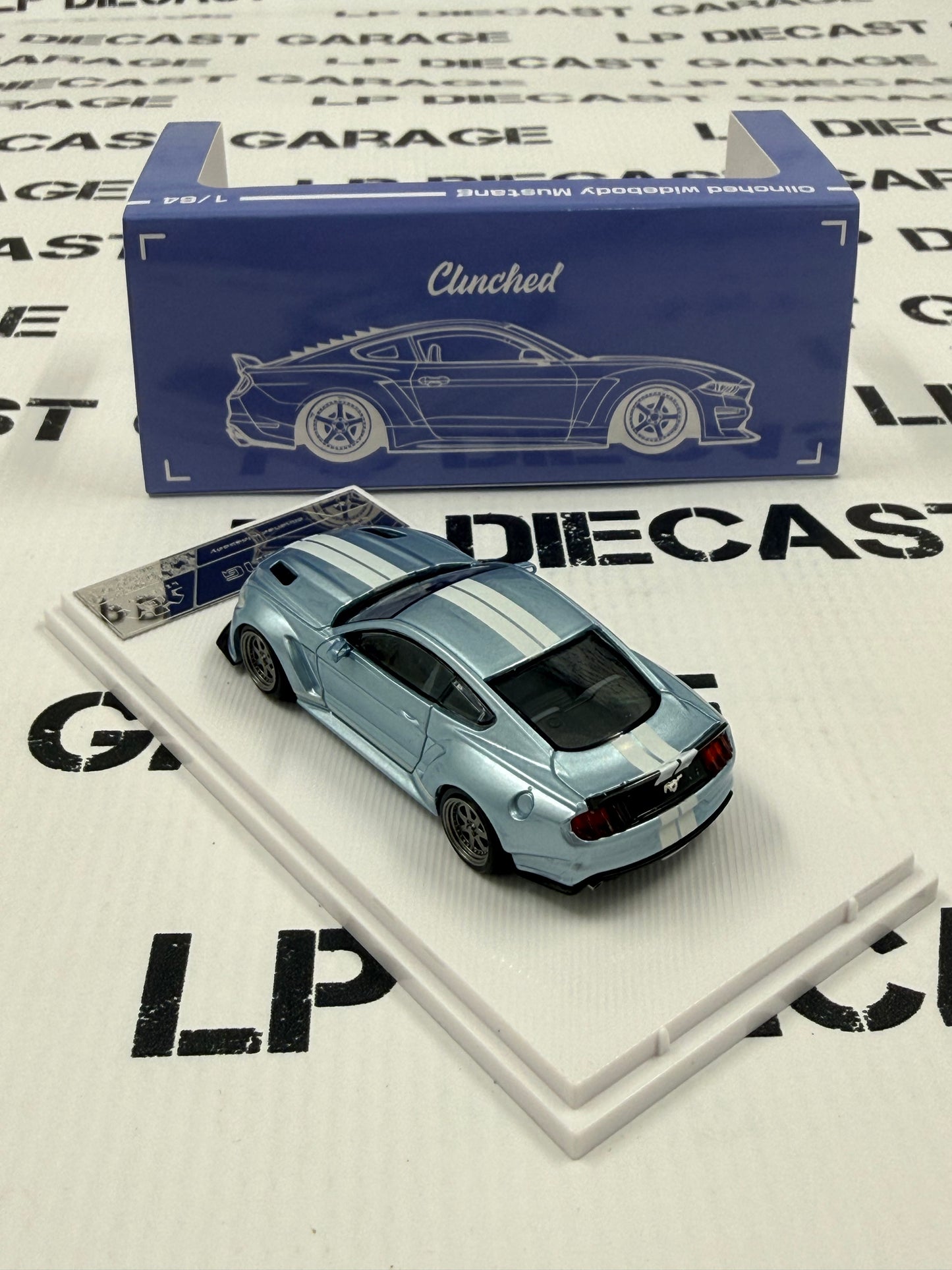 LIBERTY64 Ford Mustang Clinched Light Blue w/ White Stripes 1:64 Diecast Ghost Player