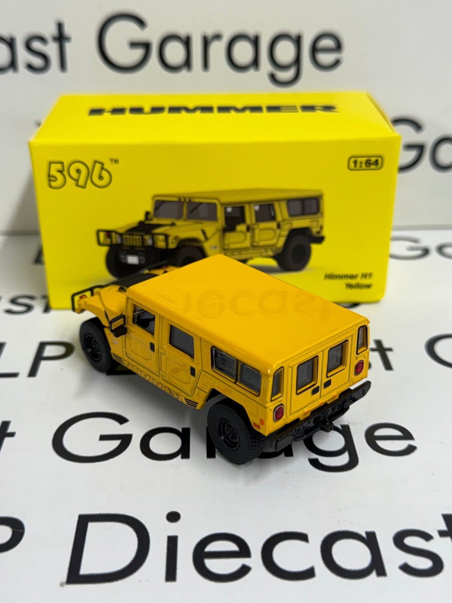 596 Model Hummer H1 Yellow 1:64 Diecast Opening Hood