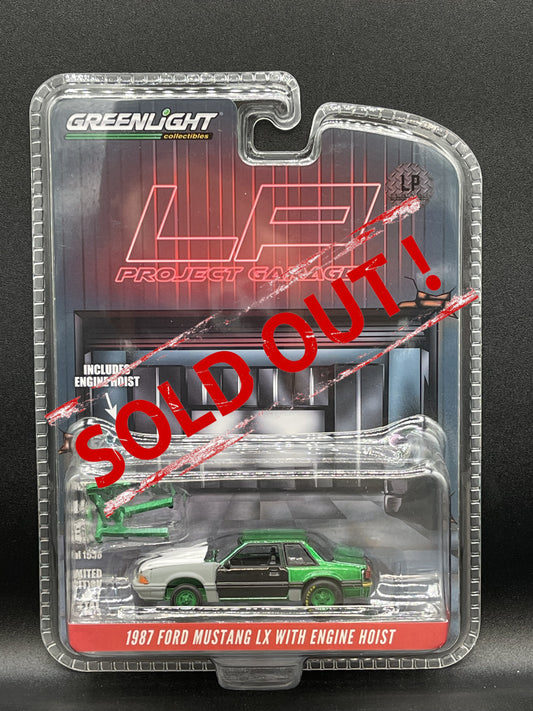 GREENLIGHT Green Machine CHASE 1987 Ford Mustang LX with Engine Hoist Black Door Project LP Diecast Garage Exclusive 1:64 Diecast Promo