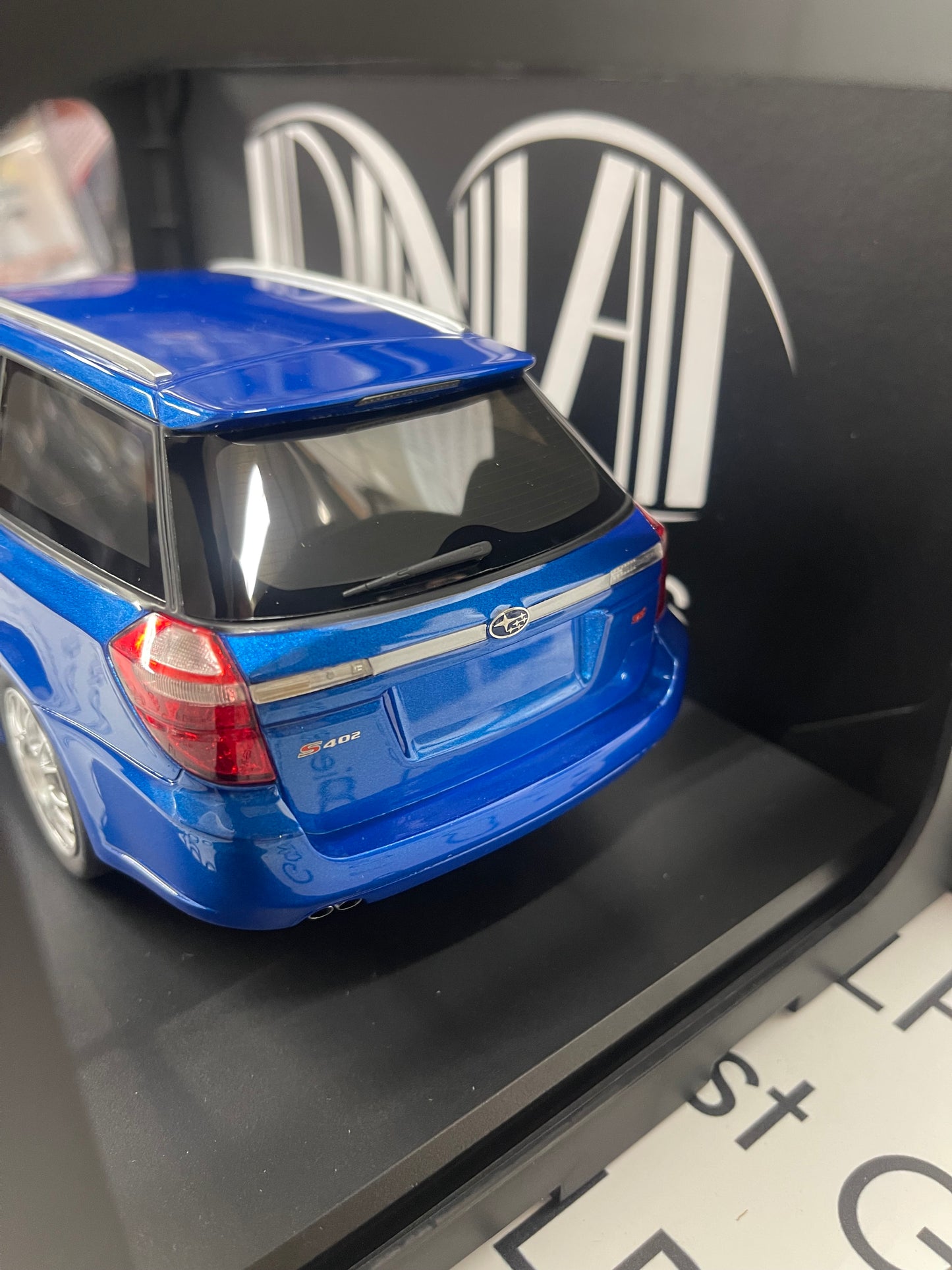 DNA Collectibles 2006 Subaru Legacy Touring Wagon STI S402 Blue 1:18 Scale Resin Model