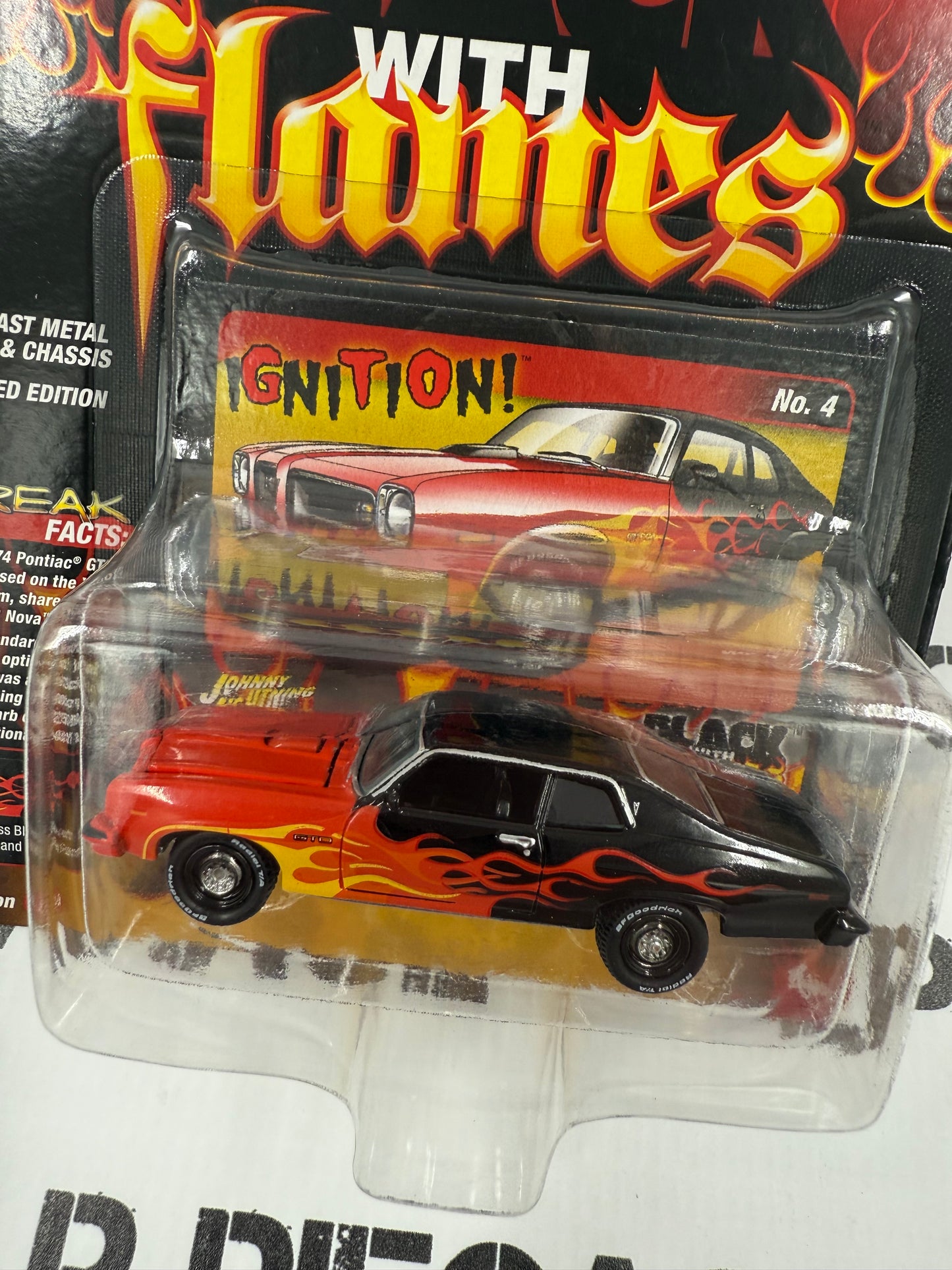 JOHNNY LIGHTNING 1974 Pontiac GTO Black w/ Red Flames 1:64 Diecast