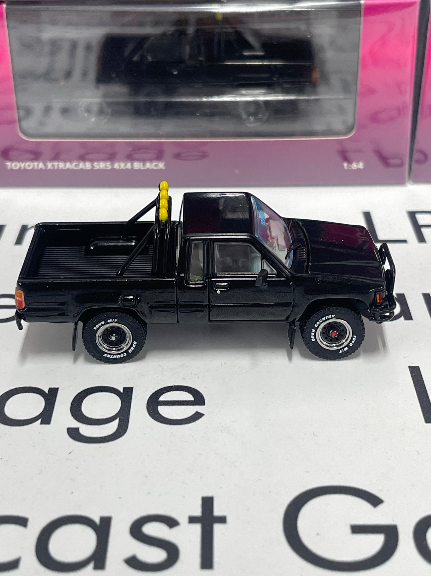 GCD DiecastTalk Exclusive 1985 Toyota Hilux SR5 Xtracab Black Pickup Truck Back To The Future BTTF Marty Mcfly 1:64 Diecast