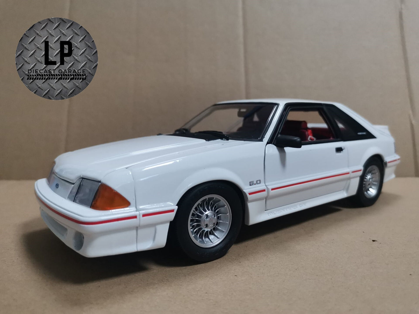 *PRE-ORDER* GMP 1988 Ford Mustang GT Oxford White w/ Red Body Stripe LP Diecast Garage Exclusive 1:18 Diecast Q4 2023 Release