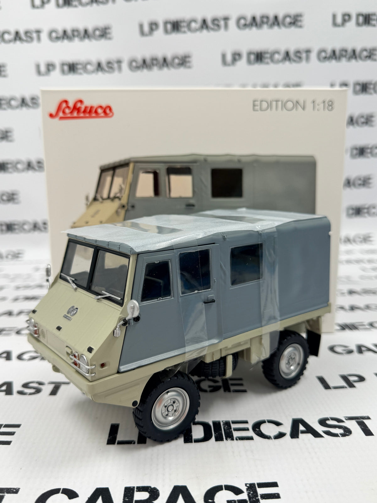 SCHUCO 1975 Steyr-Puch Haflinger Gray & White Truck 1:18 Diecast Model