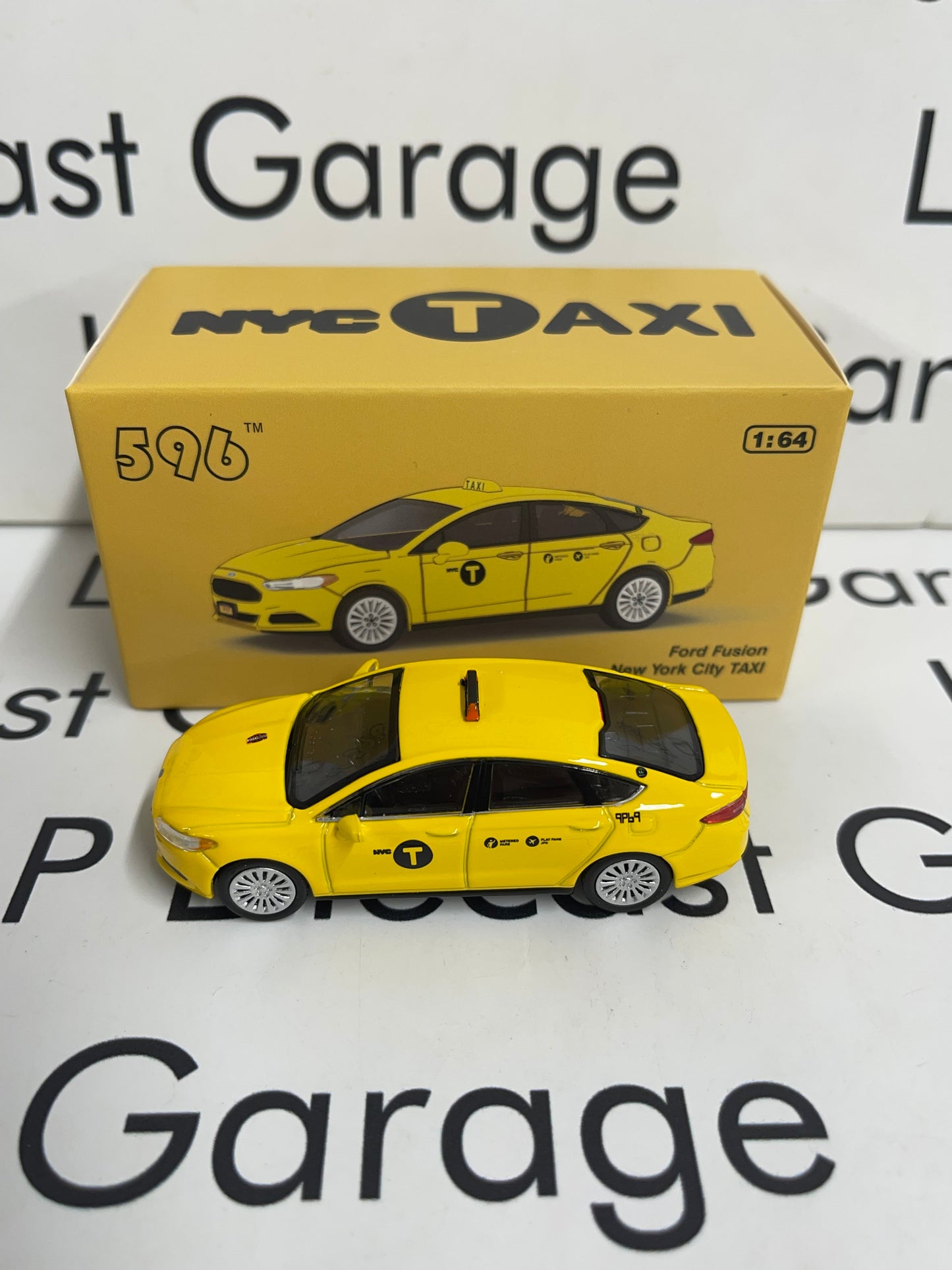 596 Model Ford Fusion NYC Taxi 1:64 Diecast