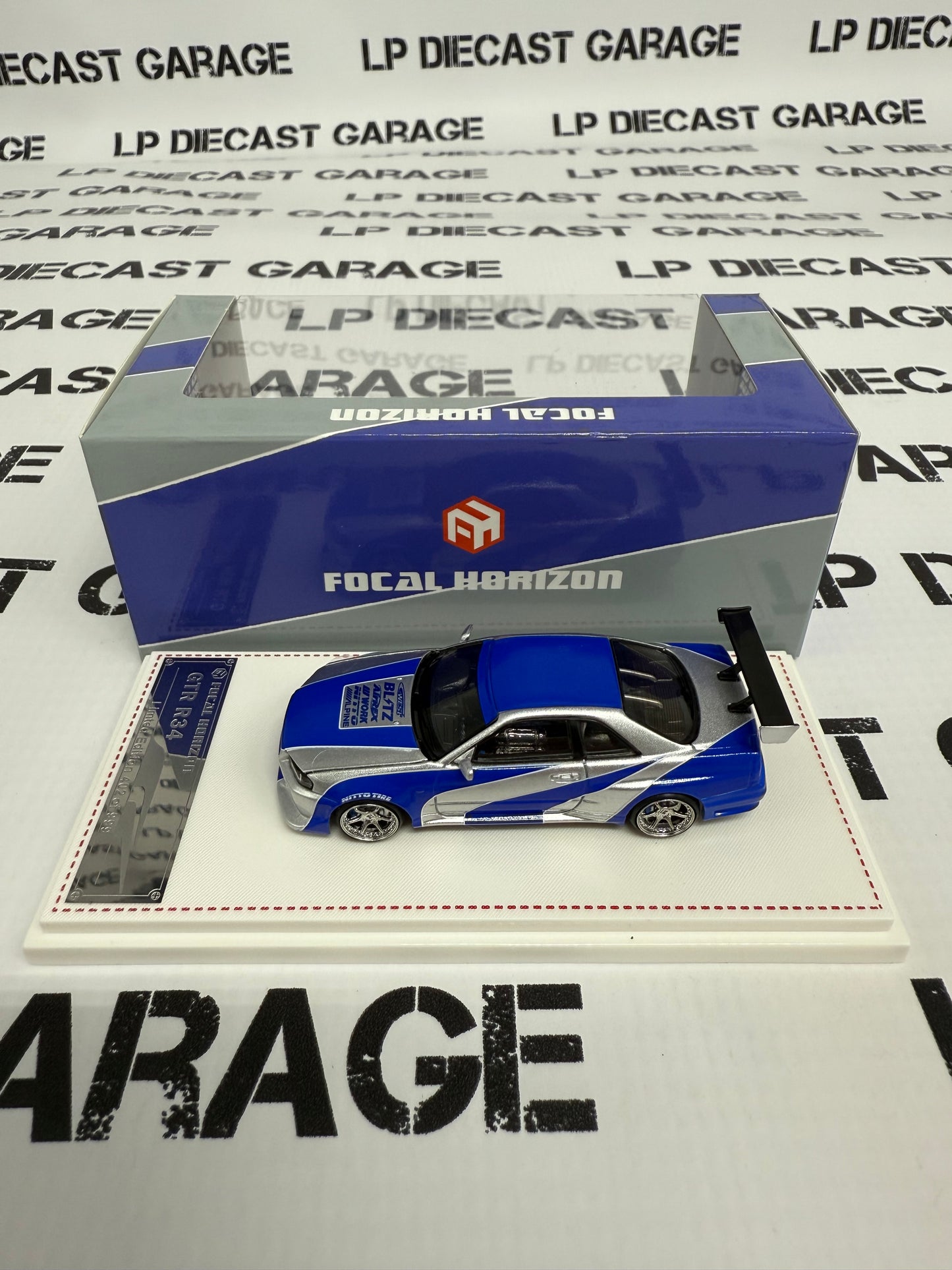 FOCAL HORIZON Nissan Skyline GT-R R34 Blue & Silver 1:64 Diecast Ghost Player