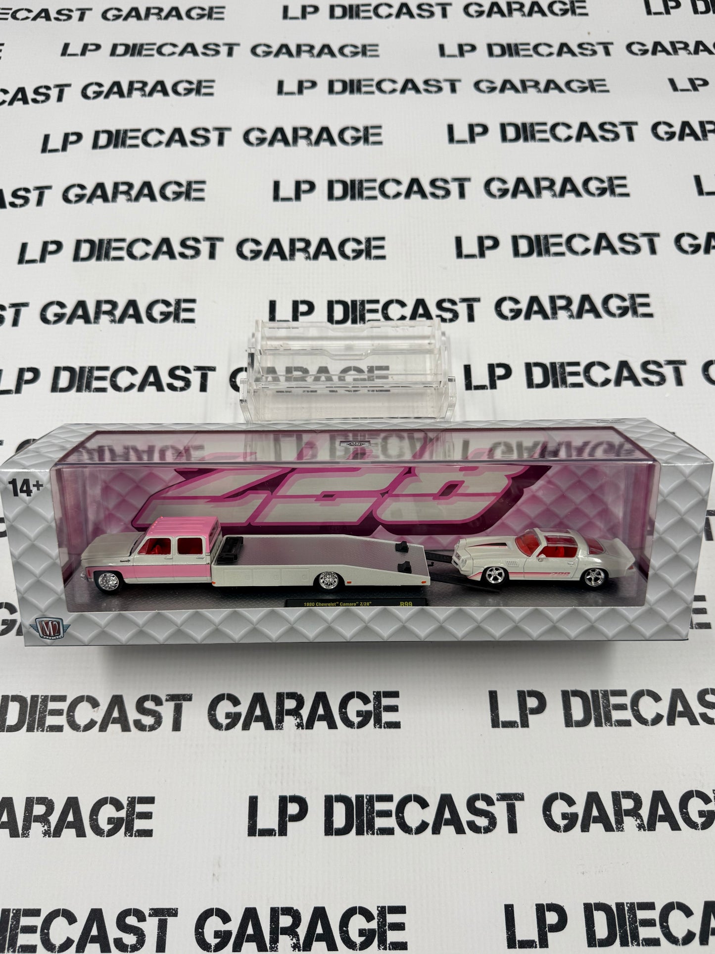 M2 Haulers 1980 Chevy Ramp Truck & Chevrolet Camaro Z28 Pink White 1:64 Diecast