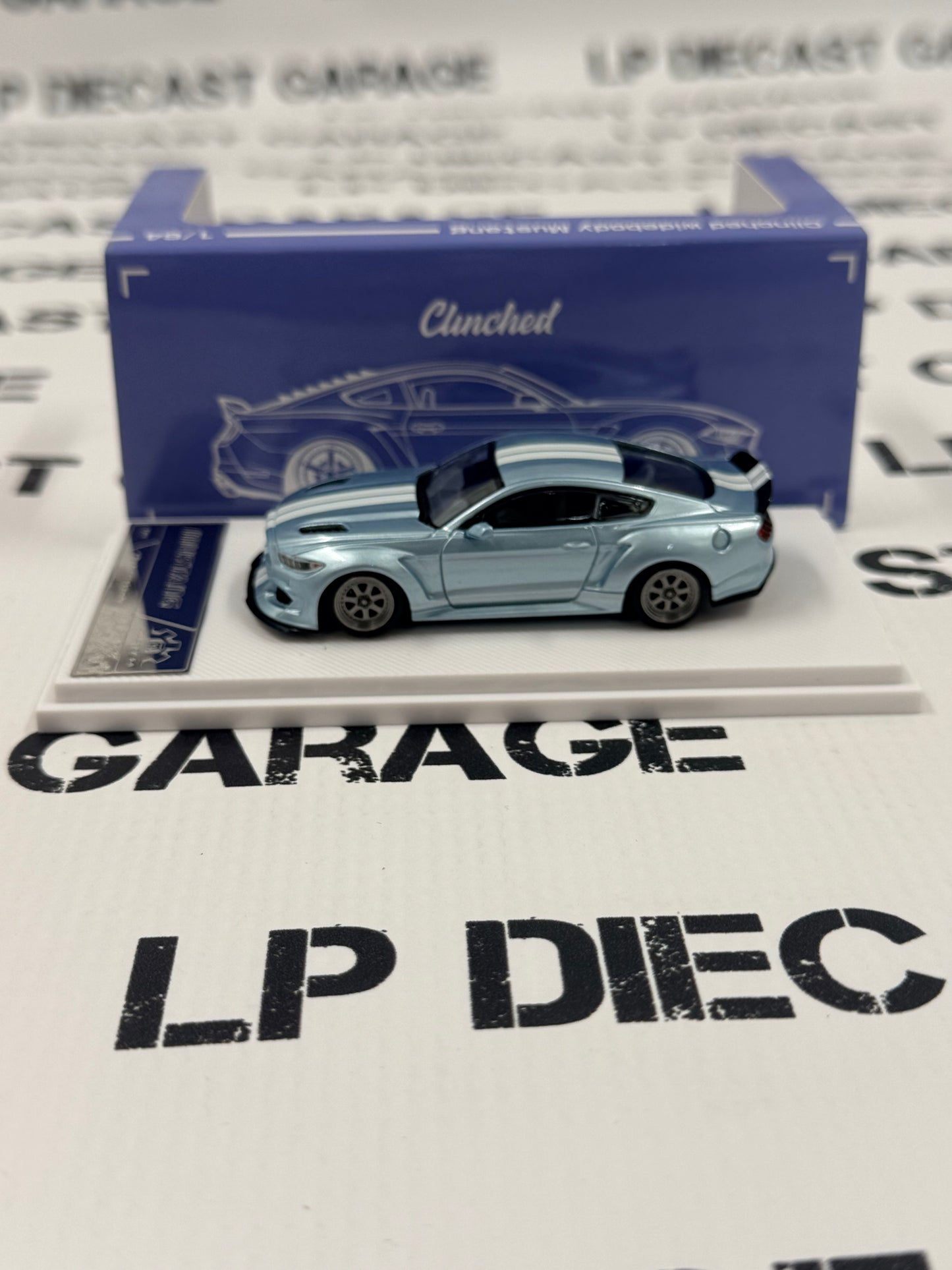 LIBERTY64 Ford Mustang Clinched Light Blue w/ White Stripes 1:64 Diecast Ghost Player
