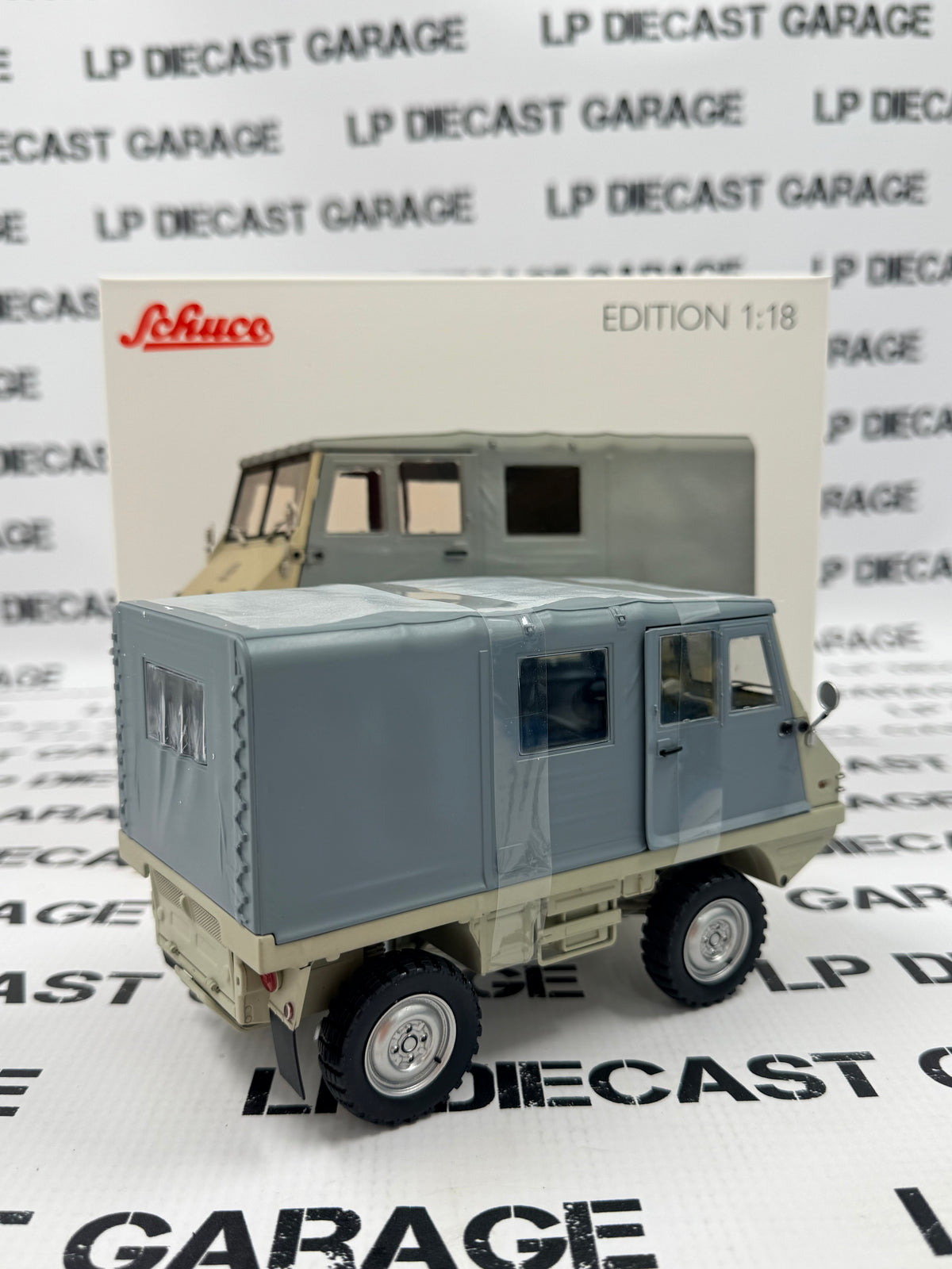 SCHUCO 1975 Steyr-Puch Haflinger Gray & White Truck 1:18 Diecast Model