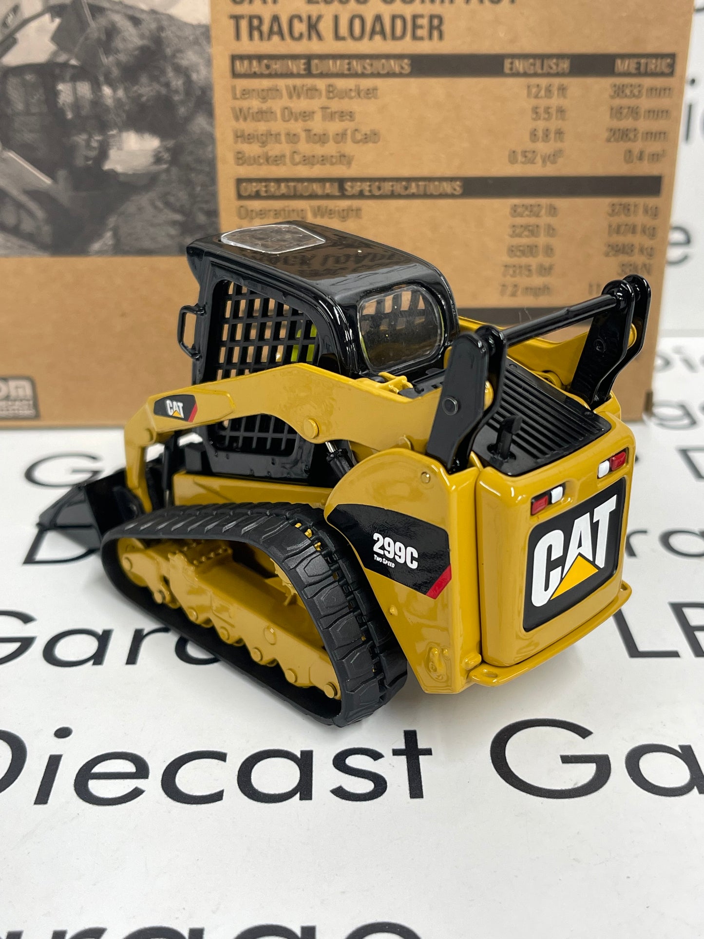 DIECAST MASTERS CAT 299C Compact Track Loader w/ Attachments 1:32 Diecast