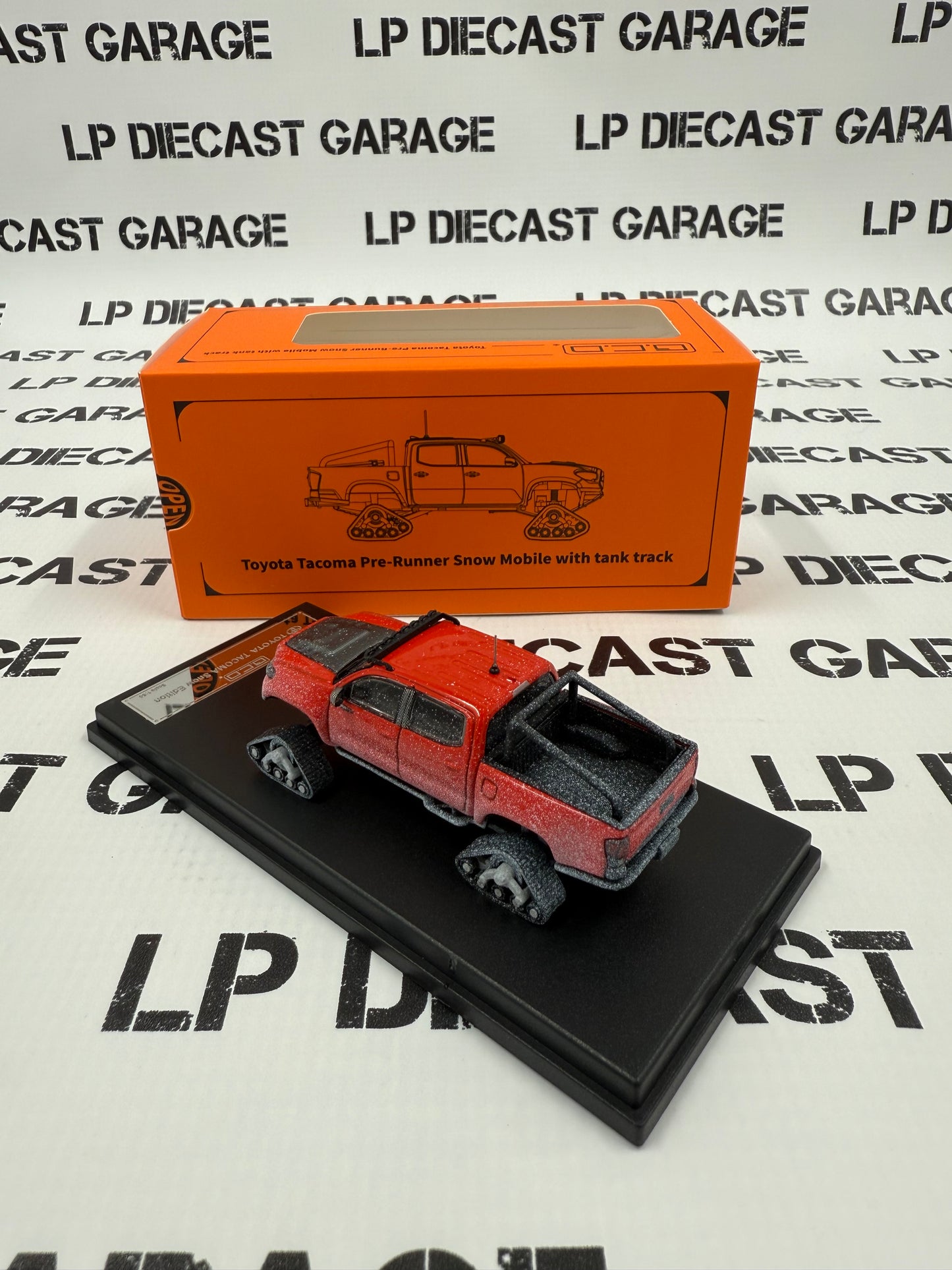 GCD 2023 Toyota Tacoma Snowmobile Red with Tracks 1:64 Diecast Snow Covered