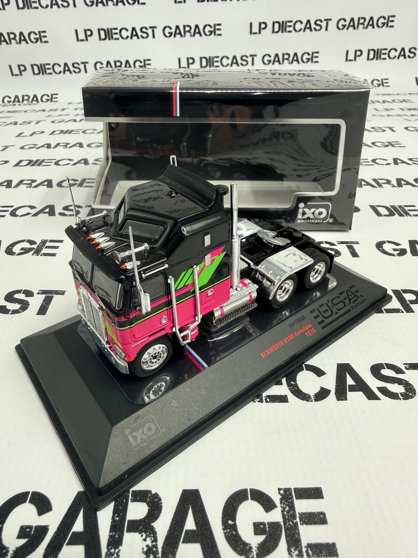 IXO Models 1976 Kenworth K100 Aerodyne Black w/ Pink Semi Truck 1:64 Diecast