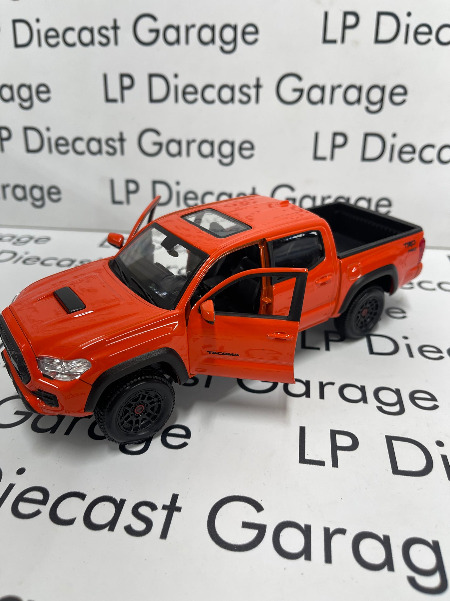 MAISTO 2023 Toyota Tacoma TRD Pro Truck Crew Cab Orange *LOOSE* 1:27 Diecast