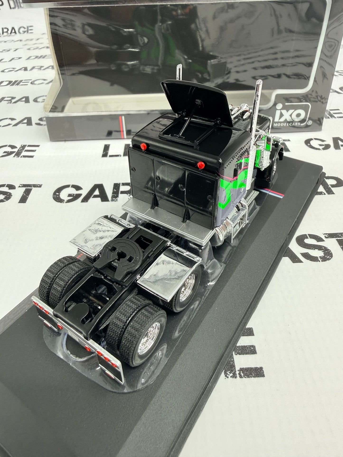 IXO Models 1973 Peterbilt 359 Black w/ Green Design Semi Truck 1:64 Diecast