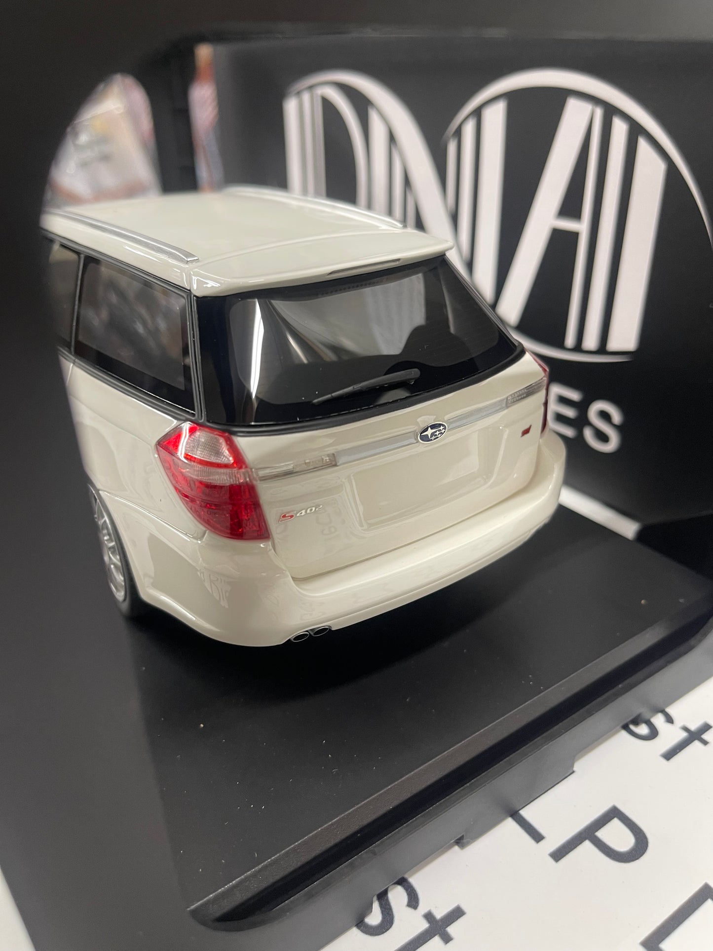 DNA Collectibles 2006 Subaru Legacy Touring Wagon STI S402 White 1:18 Scale Resin Model