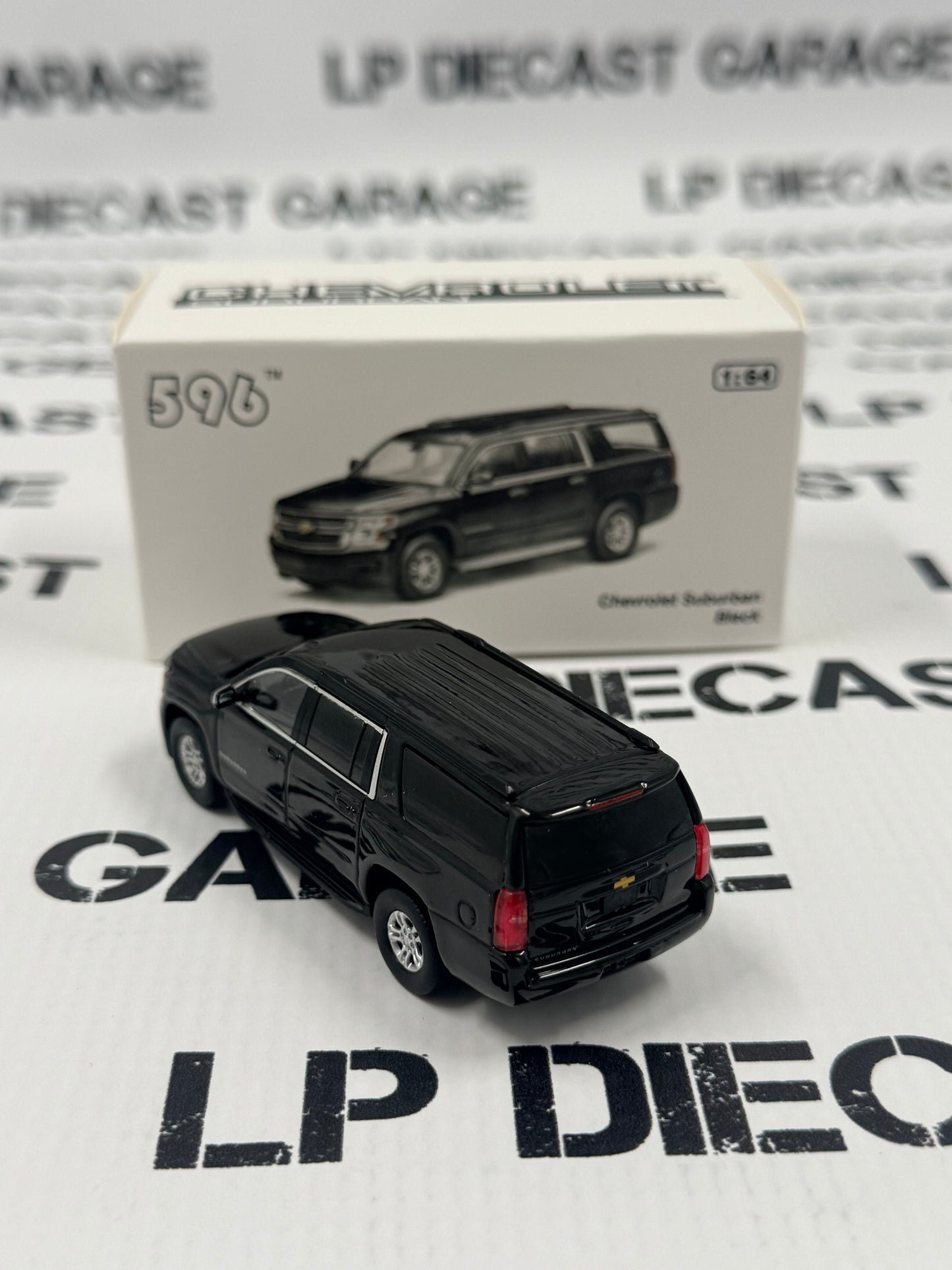 596 Model Chevrolet Suburban Black SUV 1:64 Diecast