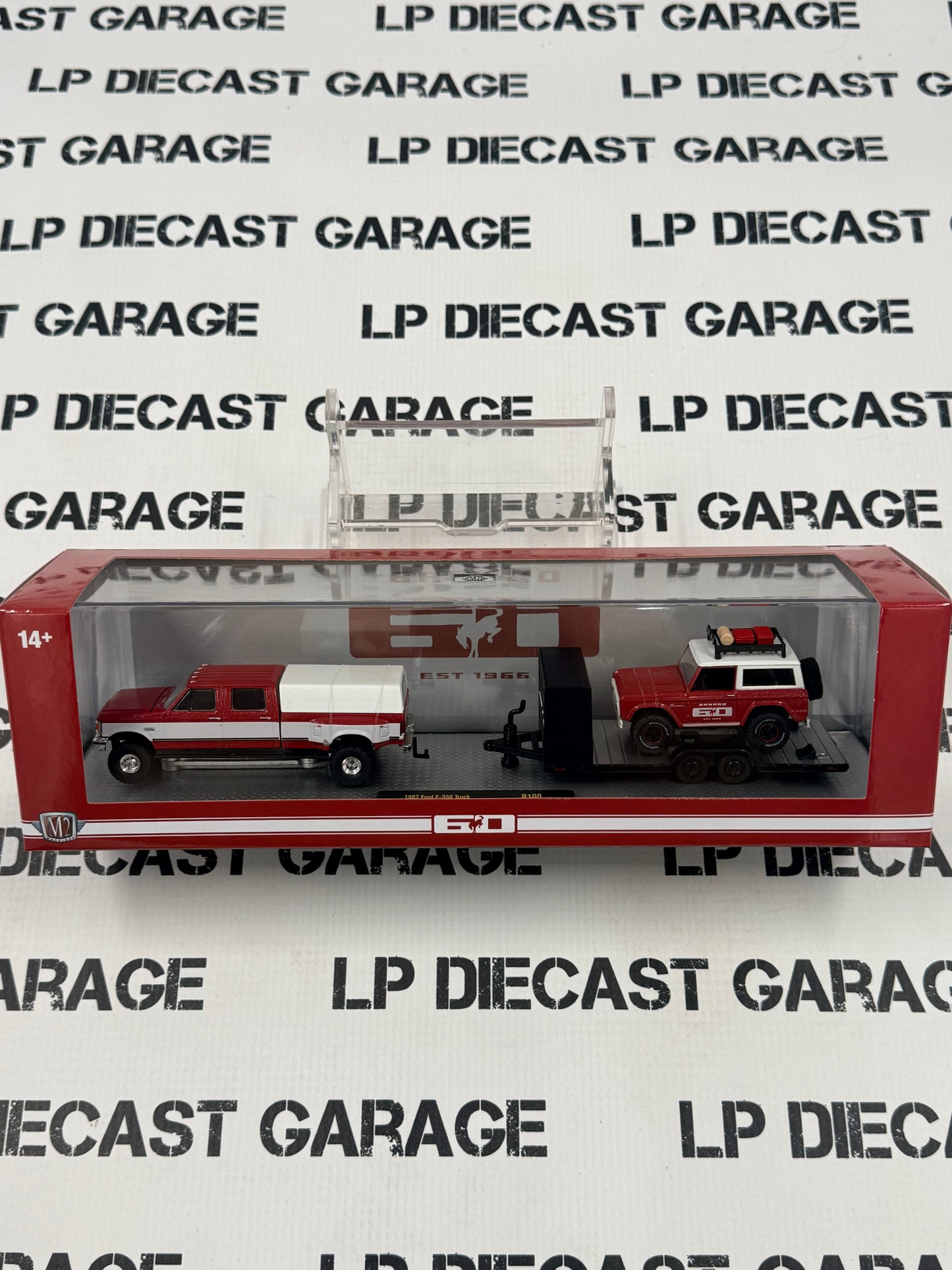 M2 Haulers 1987 Ford F-350 + 1966 Bronco Red 1:64 Diecast