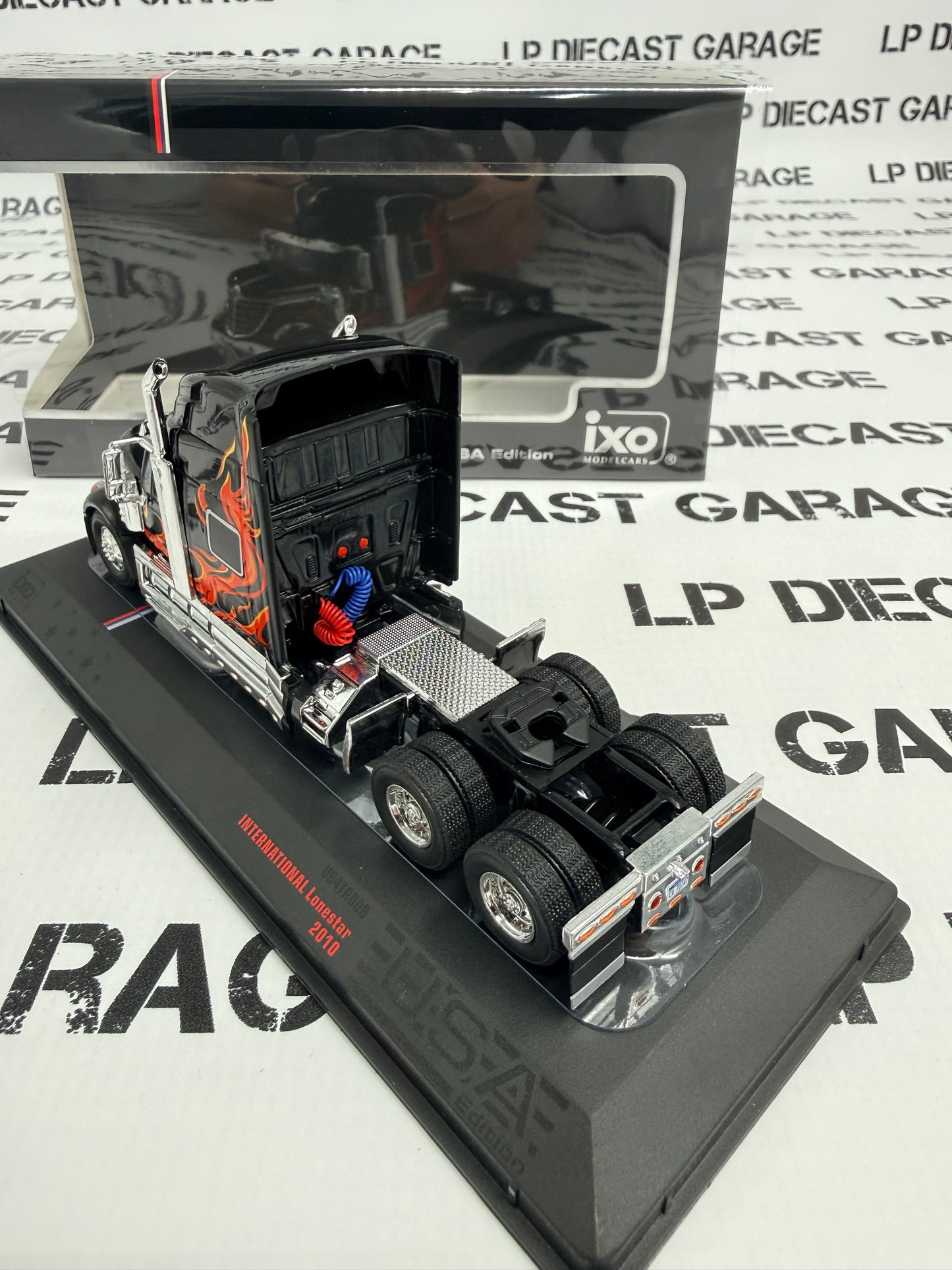 IXO Models 2010 International Lonestar Black w/ Flames Semi Truck 1:64 Diecast