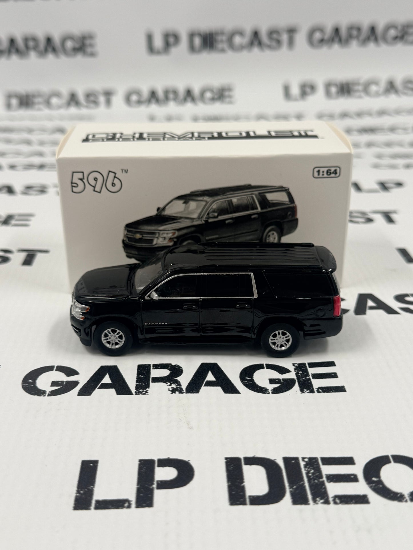 596 Model Chevrolet Suburban Black SUV 1:64 Diecast