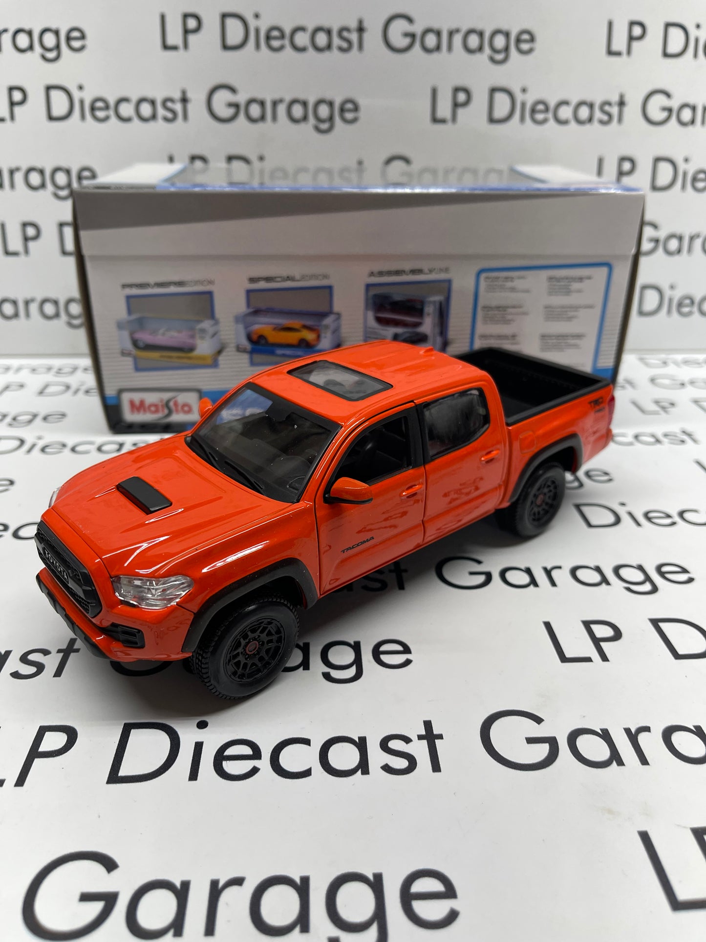 MAISTO 2023 Toyota Tacoma TRD PRO Truck Orange 1:27 Scale Diecast