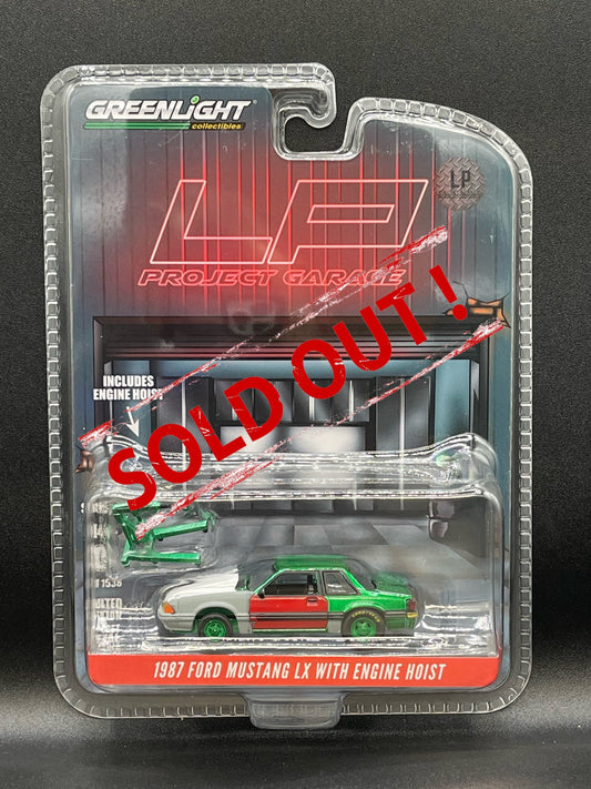 GREENLIGHT Green Machine CHASE 1987 Ford Mustang LX with Engine Hoist Red Door Project LP Diecast Garage Exclusive 1:64 Diecast Promo
