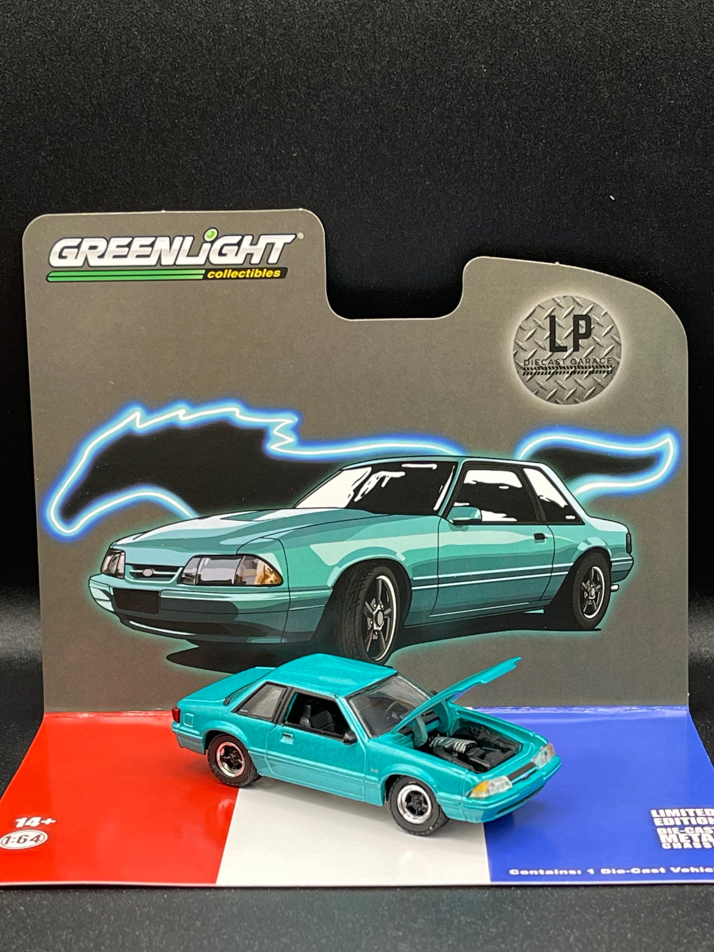 GREENLIGHT 1991 Ford Mustang 5.0 LX Coupe Calypso + Pin & Sticker LP Diecast Garage Exclusive 1st Release 1:64 Diecast Promo
